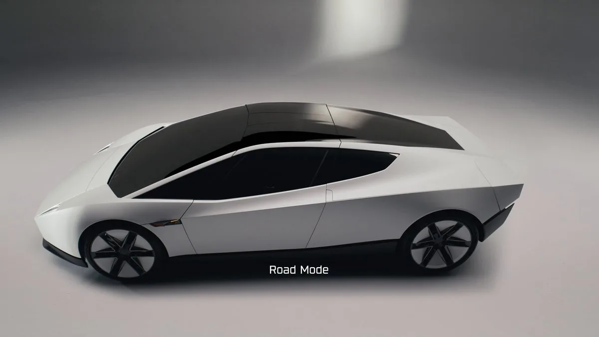 Silver angular Tesla Roadster in an overhead side view, with Road Mode written beneath the car.
